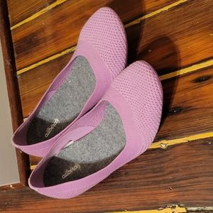 Pink Allbirds flats
